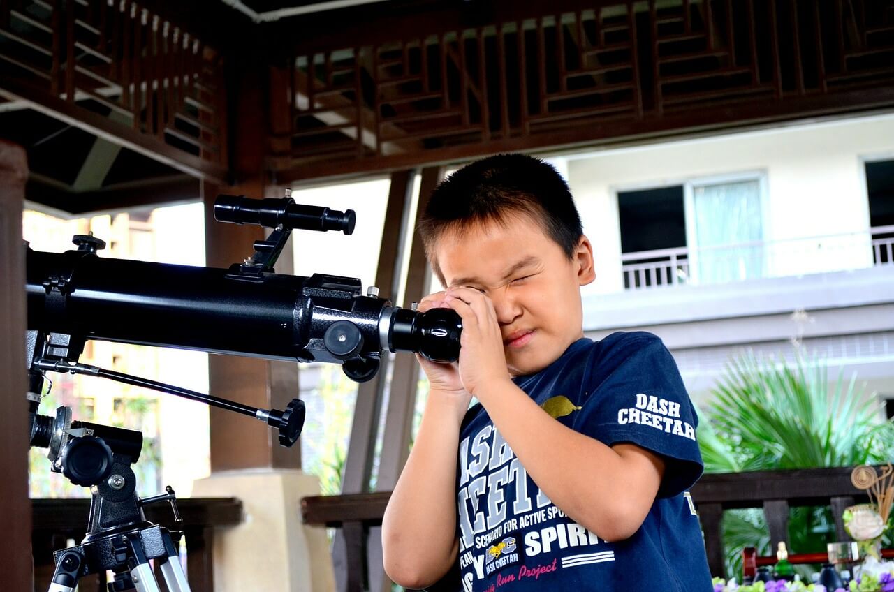 telescope and young kid